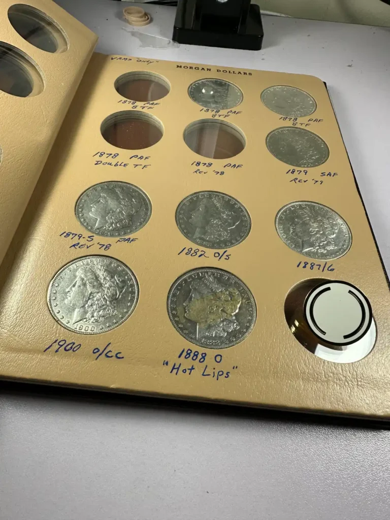 Determining the Value of a Coin Collection - Morgan Dollars Collection on a coin book