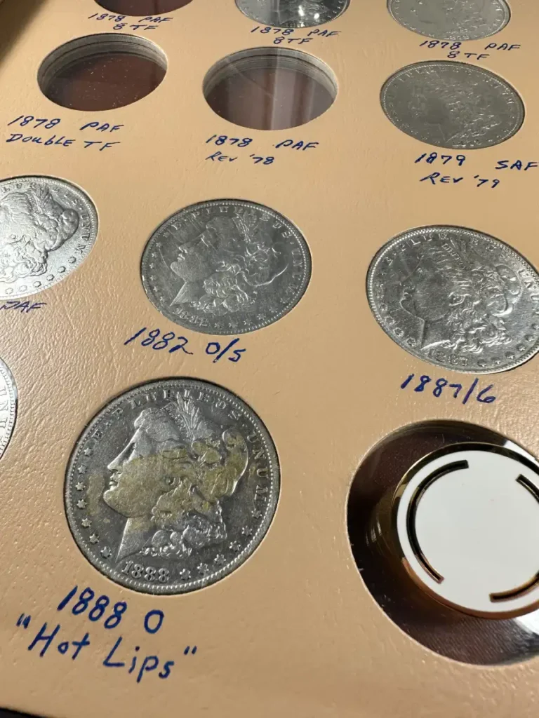 What to Do with Your Inherited Coin Collection - Morgan dollars coin collection on a coin book