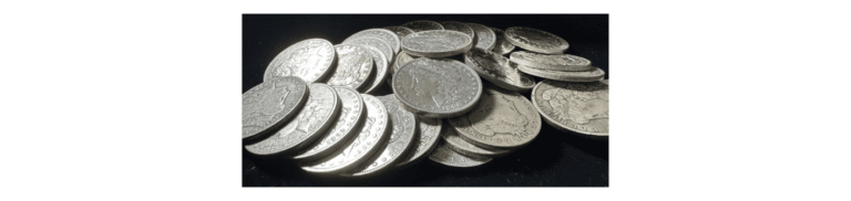 Concise guide on selling silver coins, featuring a pile of various silver coins on a dark background.