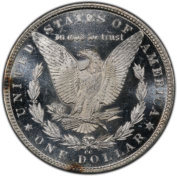 U.S. one dollar coin featuring an eagle with the text "In God We Trust"
